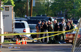 Police officers not far from James Holmes' house