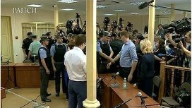 Alexei Navalny being handcuffed